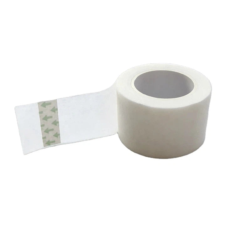Adhesive tape partially unrolled to display its strong perforated structure
