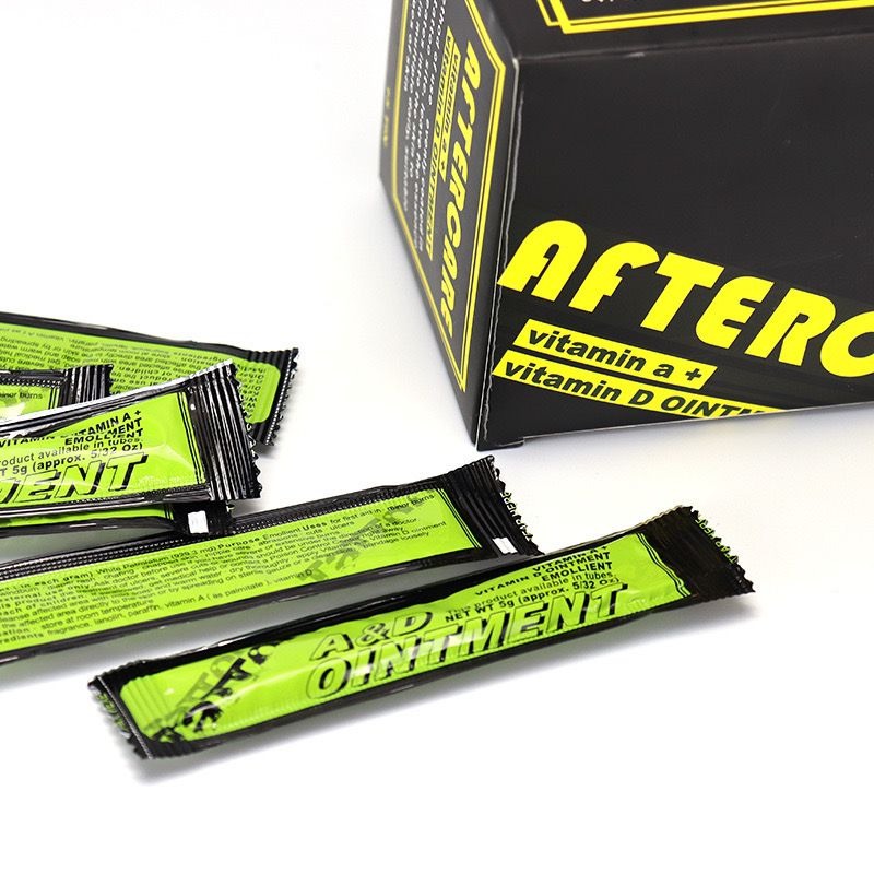 Aftercare box alongside multiple 5ml sachets for tattoo aftercare use.
