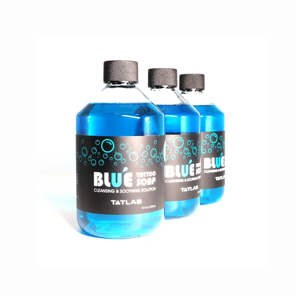 Blue Soap cleansing and soothing solution for tattoo procedures, available in 500ml bottles, ideal for professional use.