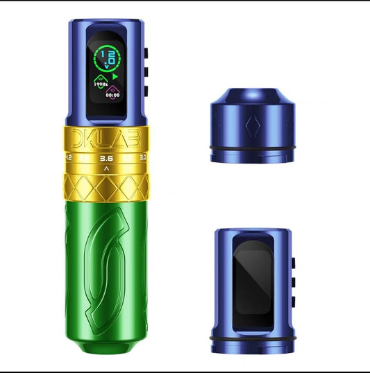 Photograph showcasing the "DKlab" rotary pen-style tattoo machine in blue, gold, and green colors, accompanied by two batteries and an RCA adapter. The device's sleek design and vibrant colors are prominently displayed, offering a glimpse into the versatility and functionality of this rotary machine.