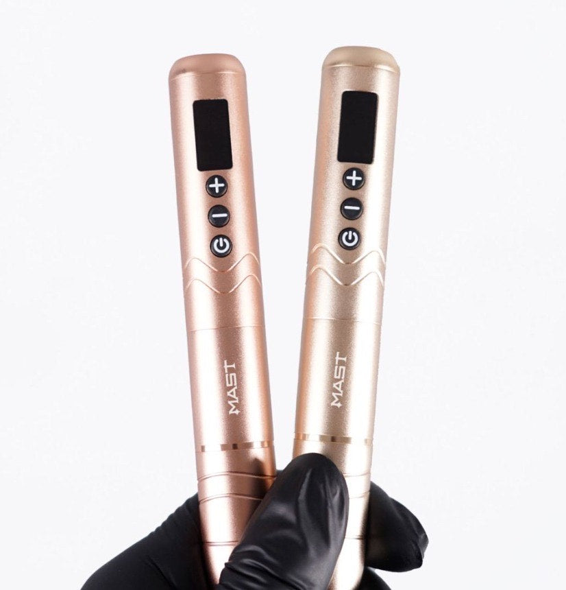 Mast Nano 2 PMU Pen Machine held in hand, showcasing ergonomic design.