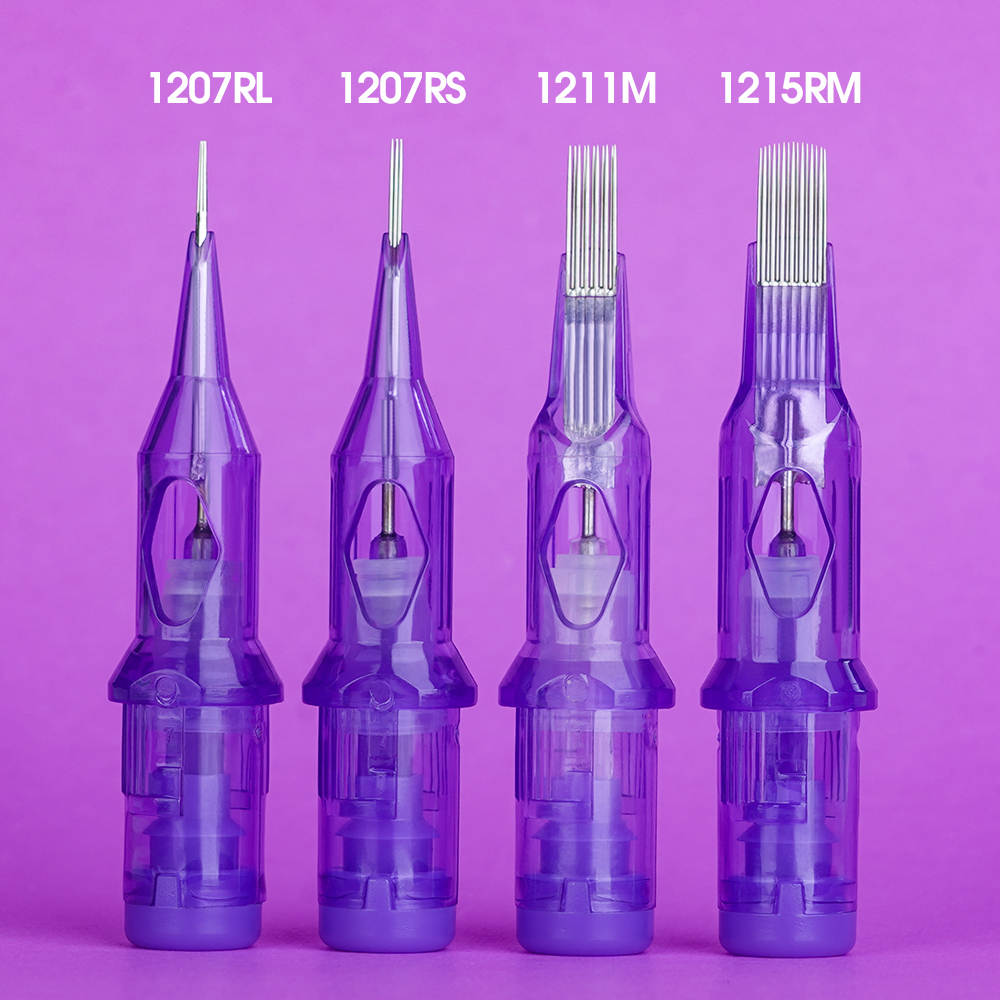 Photograph showing four Mast Pro Tattoo Cartridges Needles arranged next to each other. The cartridges are labeled as 1207RL, 1207RS, 1211M, and 1215RM, showcasing a variety of needle configurations.