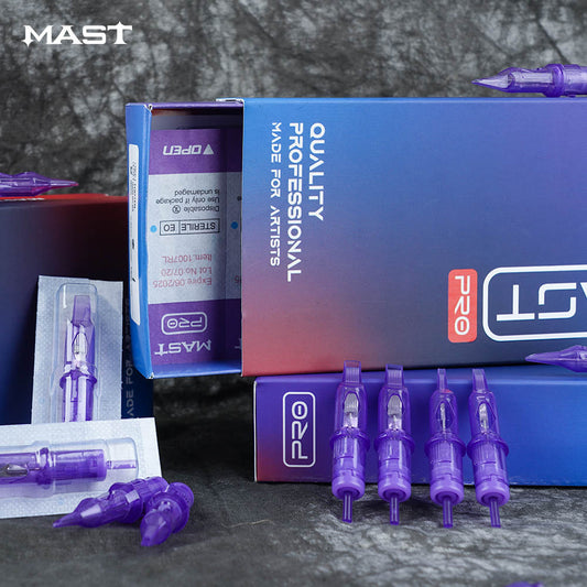 Photograph showing a variety of Mast Pro Tattoo Cartridges, some packaged and others unpacked, along with a few boxes in the background. The cartridges are neatly arranged, showcasing the range of options available.