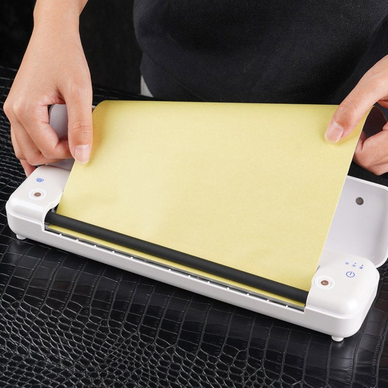 Setting up the MAST Smart Wireless Printer with easy-to-use thermal transfer paper, ideal for professional tattoo stencil transfers.