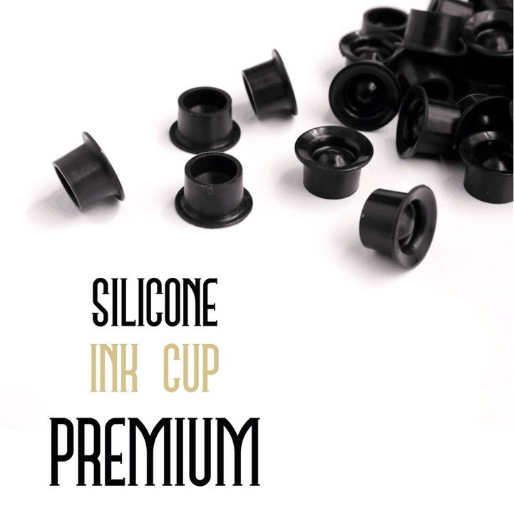 Premium black silicone ink cups displayed in a close-up, highlighting their durable design for professional tattoo use.