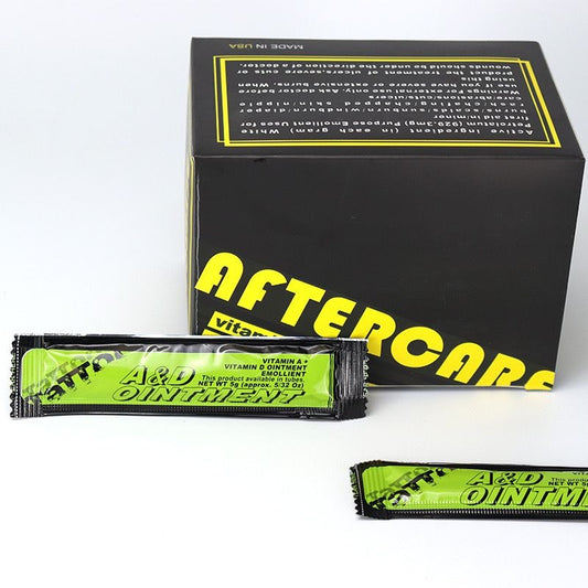 Box of aftercare doses and a single 5ml sachet for tattoo aftercare.