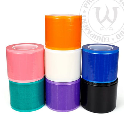 Image of disposable protective film in assorted colors. Six rolls in pink, green, orange, white, purple, and blue, arranged in two rows.