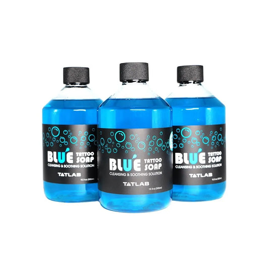 Blue Soap cleansing and soothing solution for tattoo procedures, available in 500ml bottles, ideal for professional use.