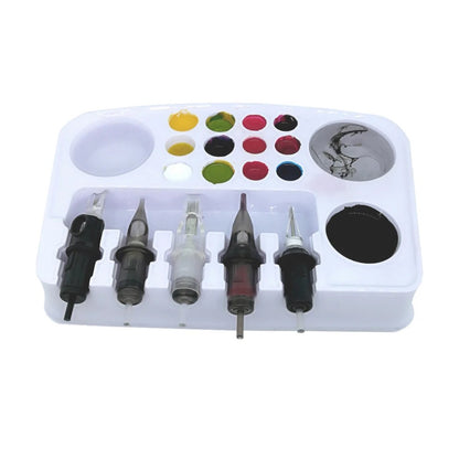 Disposable palette loaded with cartridges and paint for organized tattooing