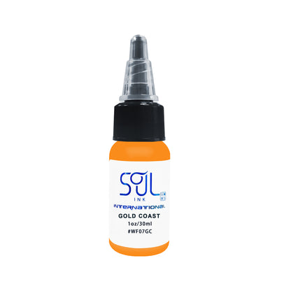 Photograph of a bottle of 'Soul Ink' brand Gold Coast ink. The label prominently displays the brand name 'Soul Ink' in stylish blue typography against a white background. The Gold Coast 30 ml bottle with a white label featuring the brands name 'Soul Ink'. 