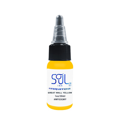 Photograph of a bottle of 'Soul Ink' brand Great Wall yellow ink. The label prominently displays the brand name 'Soul Ink' in stylish blue typography against a white background. The Great Wall yellow 30 ml bottle with a white label featuring the brands name 'Soul Ink'. 