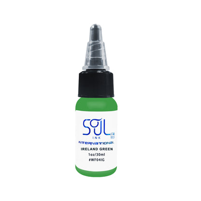 Photograph of a bottle of 'Soul Ink' brand Ireland green ink. The label prominently displays the brand name 'Soul Ink' in stylish blue typography against a white background. The Ireland green 30 ml bottle with a white label featuring the brands name 'Soul Ink'. 