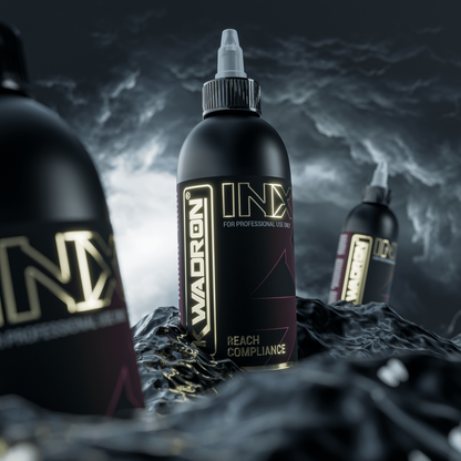 KWADRON INX™ tattoo ink bottle displayed on a dramatic black background for intense effect.