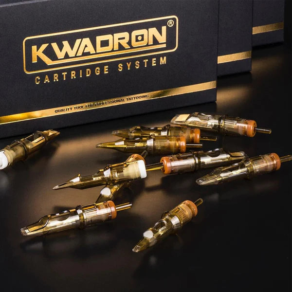 Artistic arrangement of Kwadron Cartridge System needles showcasing various sizes and configurations.