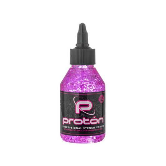 Proton Professional Stencil Primer in a pink bottle, designed for precise and long-lasting tattoo stencil transfers.