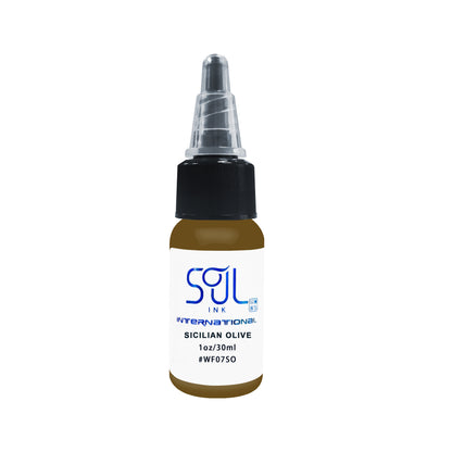 Photograph of a bottle of 'Soul Ink' brand Sicilian olive ink. The label prominently displays the brand name 'Soul Ink' in stylish blue typography against a white background. The Sicilian olive 30 ml bottle with a white label featuring the brands name 'Soul Ink'. 