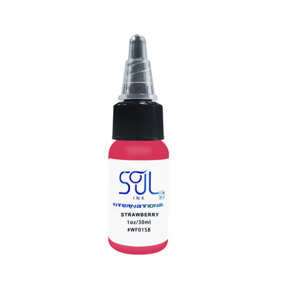 Photograph of a bottle of 'Soul Ink' brand strawberry ink. The label prominently displays the brand name 'Soul Ink' in stylish blue typography against a white background. The strawberry 30 ml bottle with a white label featuring the brands name 'Soul Ink'. 